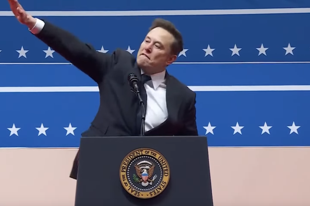 Elon Musk giving what appeared to be a Nazi salute during a post-inauguration celebration for President Donald Trump, on January 20, 2025. (Screenshot: PBS News)
